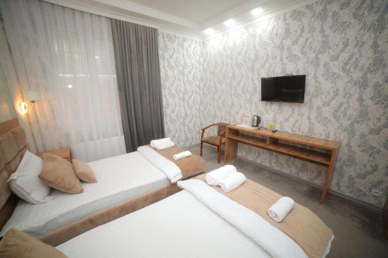 Hotel Tinchlik Plaza Ургенч Екстериор снимка